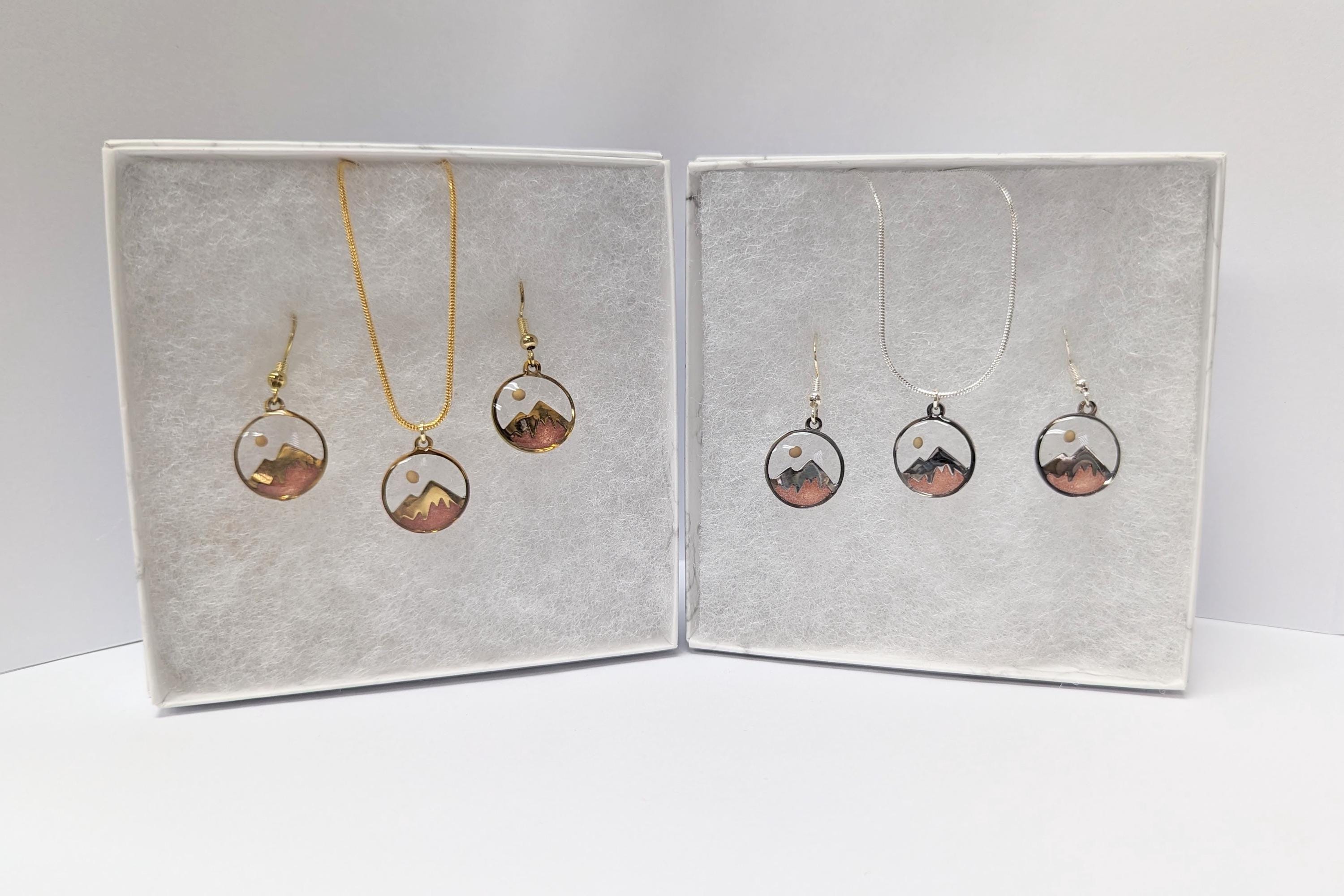 Mustard Seed Mountain Scene Necklace and Earring Set.